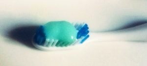 Toothpaste on toothbrush bristles